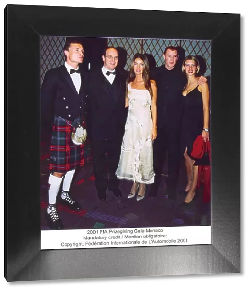 2001 FIA Prizegiving Gala Monaco David Coulthard and Richard Burns with girlfriends Mandatory credit  /  Mention obligatoire: Copyright Federation Internationale de L Automobile 2001. For publication in editorial print media only