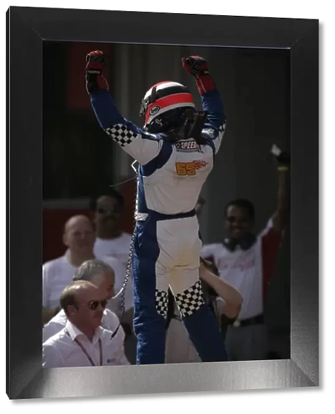 2008 Speedcar Series. Saturday Race. Dubai. Dubai Autodrome. 12th April. 2008 Speedcar champion Johnny Herbert celebrates victory. World Copyright: Alastair Staley  /  LAT Photographic Service ref: __P9O4731. jpg