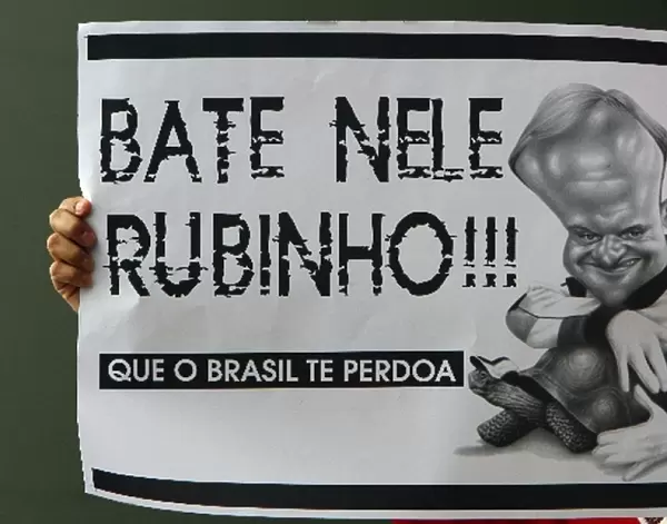 Formula One World Championship: A banner roughly translated as: Hit him and Brazil will forgive you