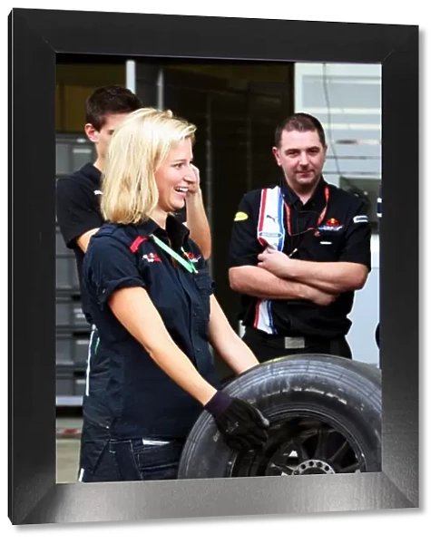 Formula One World Championship: Rita Balzsay, Red Bull Racing Hospitality Manager and the Red Bull Racing Team pit stop practice