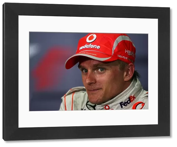 Formula One World Championship: Third placed Heikki Kovalainen McLaren in the post race FIA Press Conference