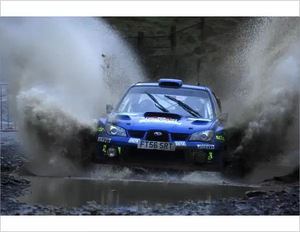 World Rally Championship: Mads Ostberg Subaru Impreza WRC in the watersplash on Stage 5, Sweet Lamb