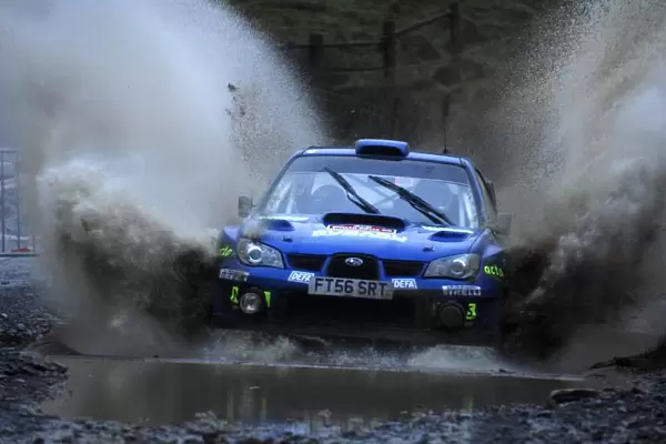 World Rally Championship: Mads Ostberg Subaru Impreza WRC in the watersplash on Stage 5, Sweet Lamb