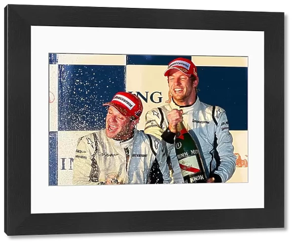 Formula One World Championship: Race winner Jenson Button Brawn Grand Prix and second placed team mate Rubens Barrichello Brawn Grand Prix celebrate