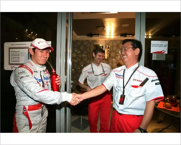Formula One World Championship: Tadashi Yamashina Toyota F1 Chairman congratulates Kamui Kobayashi Toyota on his first points finish