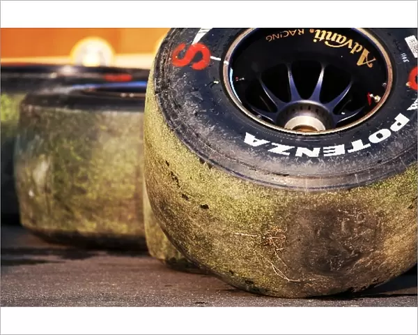 Formula One World Championship: Bridgestone tyres covered in grass