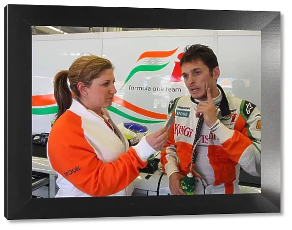 Formula One World Championship: Lucy Genon Force India F1 Team Press Officer talks with Giancarlo Fisichella Force India F1