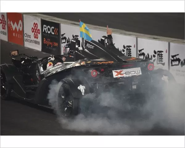 Race of Champions: Mattias Ekstrom celebrates his win with a burn out in the ROC buggy