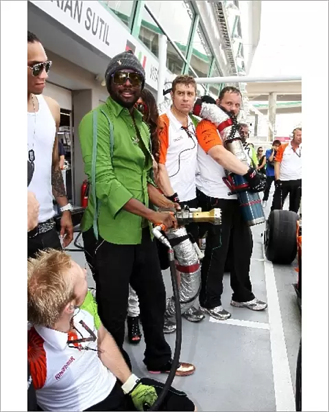 Formula One World Championship: The Black Eyed Peas practice pit stops with the Force India F1 Team