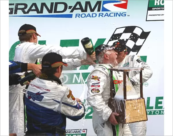 Rolex 24 at Daytona: RJ Valentine is doused with champagne by his TRG teammates following their GT class win