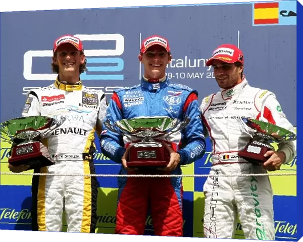 GP2 Series: The podium: Romain Grosjean Renault Third Driver, second; Edoardo Mortara Telmex Arden International, race winner Jerome d Ambrosio DAMS