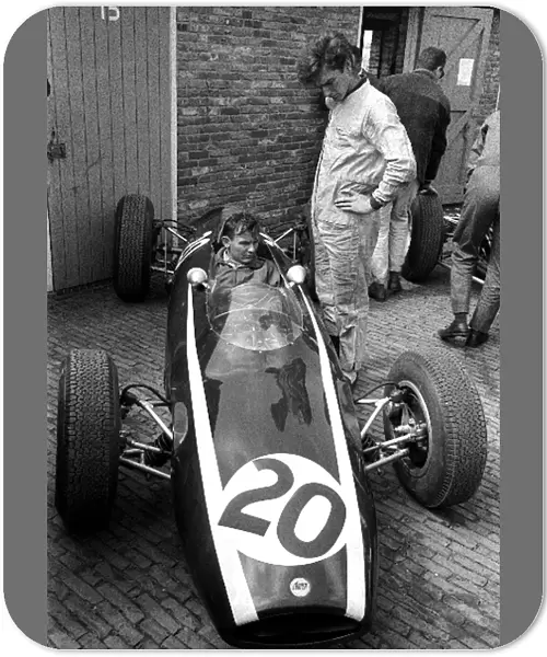 Formula One World Championship: Bruce McLaren sits in the Cooper T66. He retired early in the race with gearbox failure