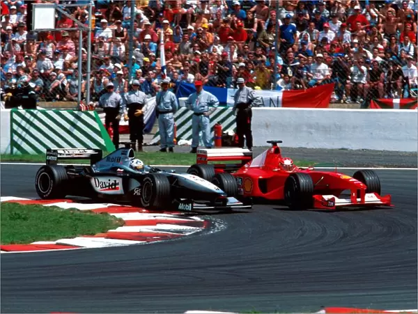Formula One World Championship: David Coulthard Mclaren MP4-15 gets by Schumacher at the hairpin