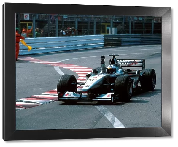 Formula One World Championship: David Coulthard Mclaren MP4-15 celebrates his win