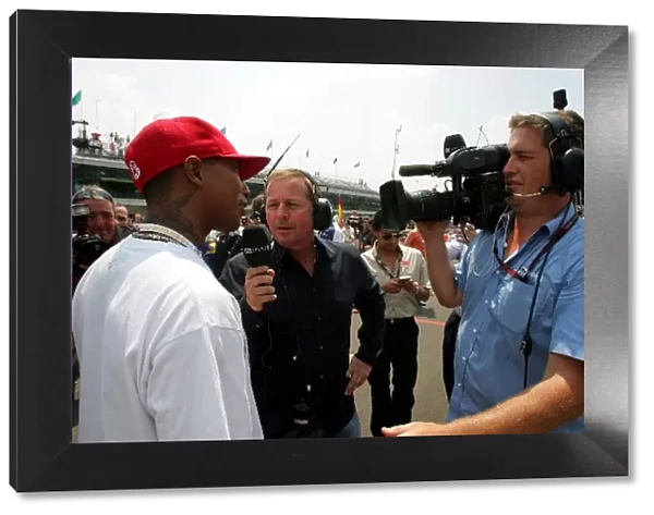 Formula One World Championship: Pharrell Williams talks with Martin Brundle