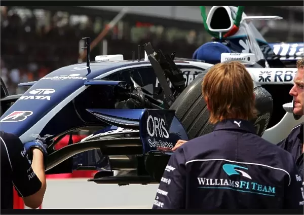 Formula One World Championship: The damaged Williams FW28 of Mark Webber Williams