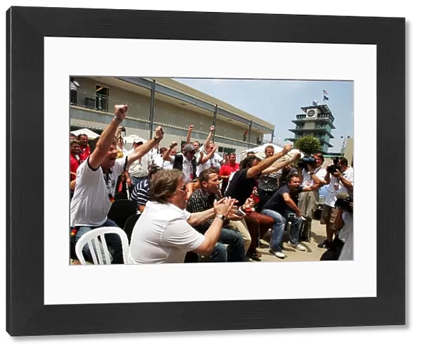 Formula One World Championship: The Germans in the paddock celebrate their penalties win over Argentina in the World Cup Quarter Final