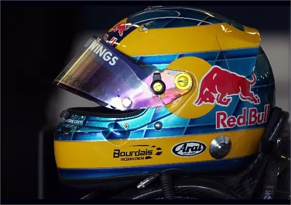 Formula One Testing: Helmet of Sebastien Bourdais Scuderia Toro Rosso in the garage
