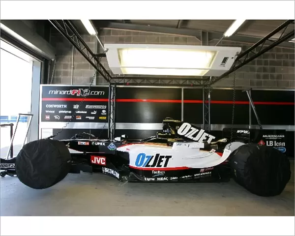GP Live Launch: A Minardi PS05 Cosworth in the pit garage
