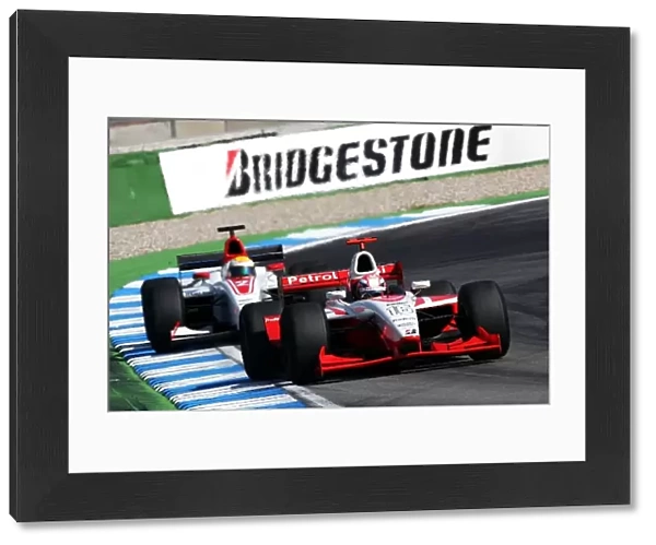 GP2 Series: Giorgio Pantano FMS International leads Lewis Hamilton ART Grand Prix