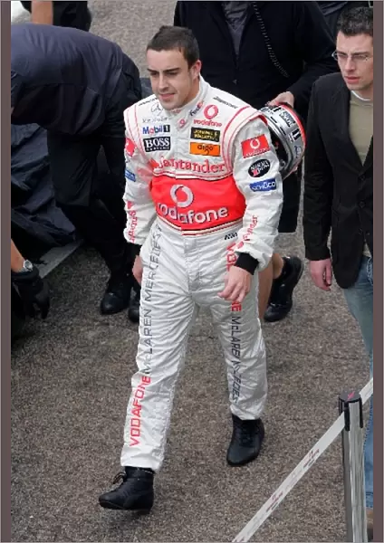 Formula One Testing: Fernando Alonso Mclaren walks back to the McLaren garage