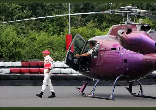 Vodafone Promo Event: Lewis Hamilton Mclaren arrives in a helicopter
