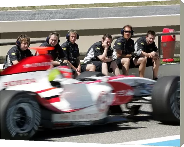 Formula One Testing: Red Bull Racing mechanics watch James Rossiter, Super Aguri F1 Test Driver