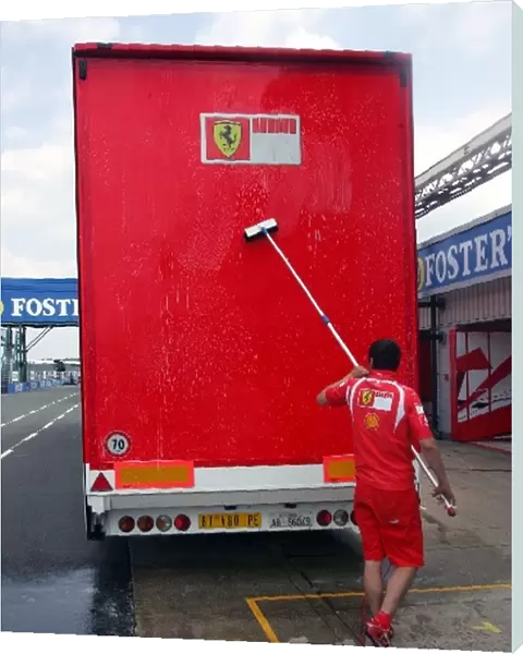 Formula One World Championship: A Ferrari truck is washed down