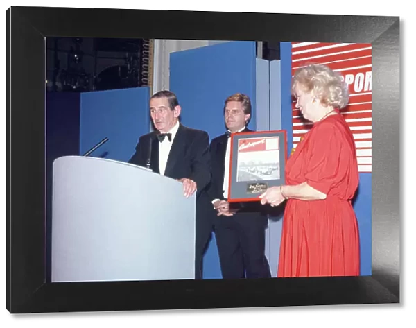 1989 Autosport Awards. Cafe Royal, London, England. 4th January 1990. John Webb receives the first ever Gregor Grant Award from Mrs Grant, portrait. World Copyright: LAT Photographic. Ref: Colour Transparency