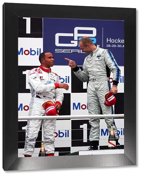 GP2 Series: The podium: second placed Lewis Hamilton ART Grand Prix with race winner Gianmaria Bruni Trident Racing