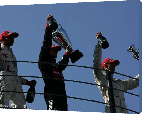 GP2: The podium: Lewis Hamilton ART Grand Prix, second and champion; Giorgio Pantano FMS International, race winner; Clivio Piccione David Price Racing
