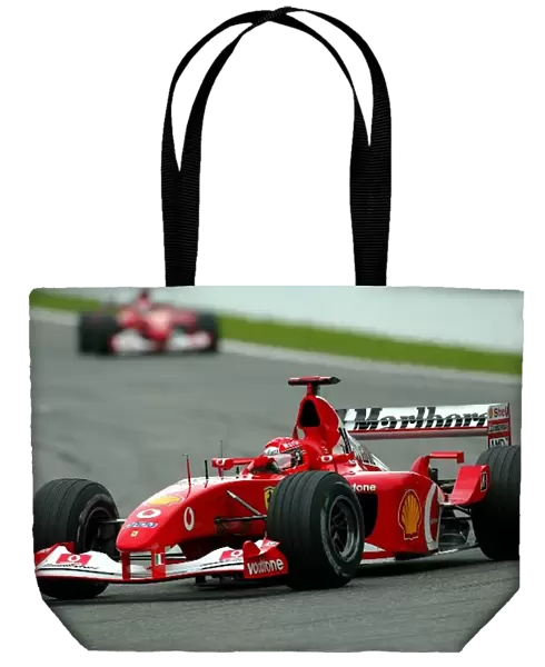 Formula One World Championship: Record breaking ten time race winner Michael Schumacher Ferrari F2002