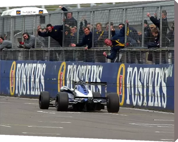 British Formula 3 Championship: Robbie Kerr crosses the line and wins to the delight of his team