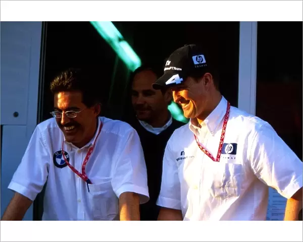 Formula One World Championship: Dr Mario Theissen BMW Motorsport Technical Director; Gerhard Berger Retiring BMW Competitions Director; Ralf