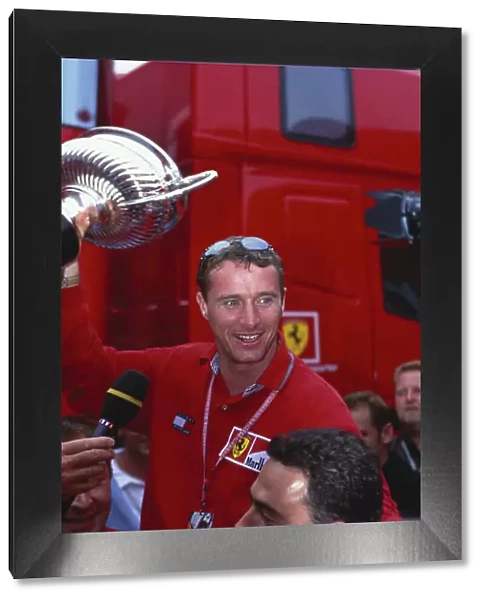 1999 Austrian Grand Prix. A1-Ring, Austria. 23-25 July 1999. Eddie Irvine (Ferrari) celebrates his 1st position. Ref-99 AUT 72. World Copyright - LAT Photographic