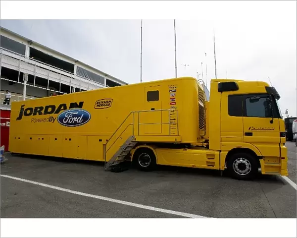 Formula One World Championship: Jordan Ford trucks in the paddock
