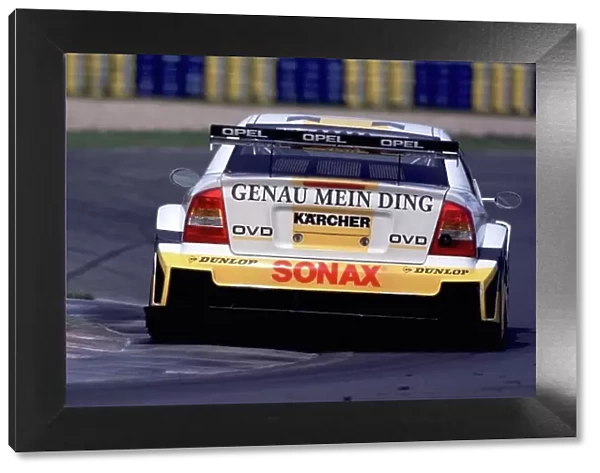 DTM Testing - Oschersleben, 16th April 2000. Five weeks before the start of the season, Four Mercedes-Benz CLK DTM and four Opel Astra VS Coupe, took part in the first major test at Oschersleben. World Griffiths / LAT