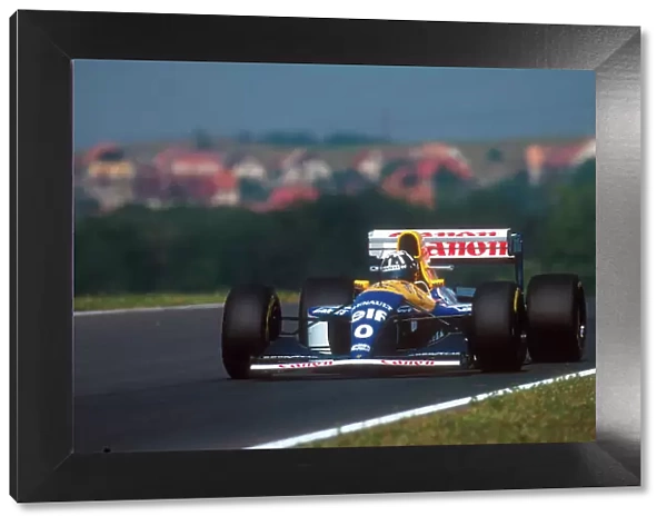 1993 Hungarian Grand Prix. Hungaroring, Hungary. 13-15 August 1993. Damon Hill (Williams FW15C Renault) 1st position for his maiden Grand Prix win. Ref-93 HUN 07. World Copyright - LAT Photographic