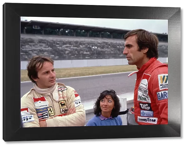 1980 German Grand Prix. Hockenheim, Germany. 8-10 August 1980. Gilles Villeneuve (Ferrari) with wife Joan behind, has a chat with Carlos Reutemann (Williams Ford). Ref-80 GER 10. World Copyright - LAT Photographic
