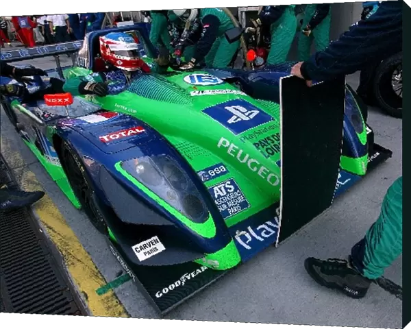 Eric Helary (FRA) Pescarolo Sport Courage C60 Peugeot Evo makes a pit stop