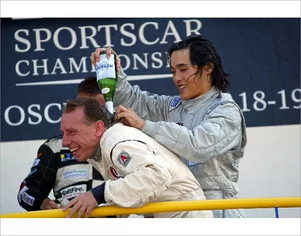 Hayanari Shimoda (JPN) RN Motorsports gives fellow winning co-driver Andy Wallace