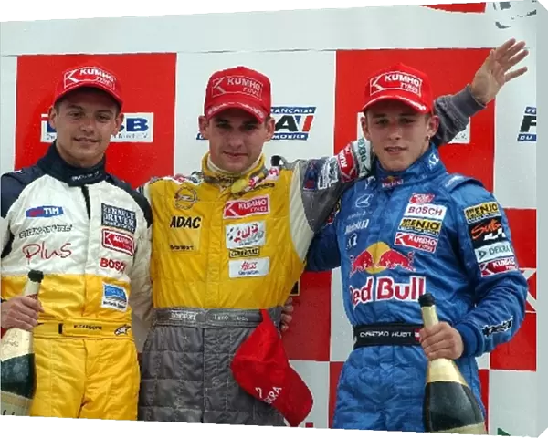 The podium (L to R): Fabio Carbone (BRA) Signature Dallara-Sodemo, second; Timo Glock