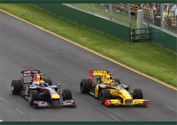 Formula One World Championship: Mark Webber Red Bull Racing RB6 and Robert Kubica Renault R30