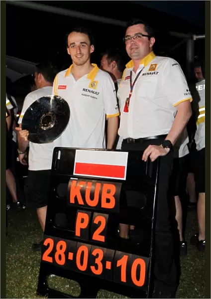 Formula One World Championship: Robert Kubica Renault and Eric Boullier Renault F1 Team Principal celebrate 2nd position