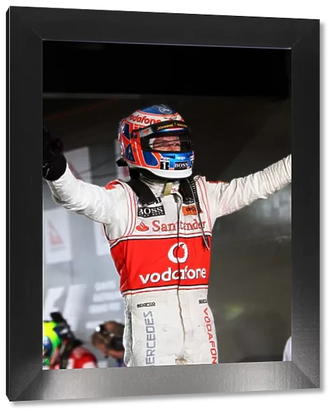 Formula One World Championship: Race winner Jenson Button McLaren celebrates in parc ferme