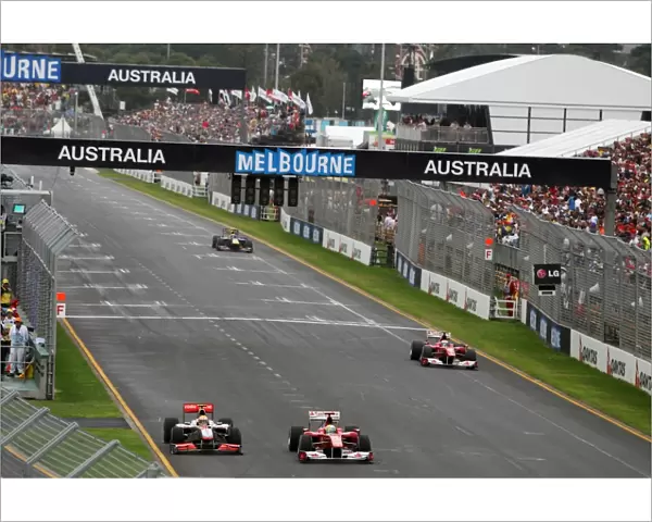 Formula One World Championship: Felipe Massa Ferrari F10 and Lewis Hamilton McLaren MP4  /  25 battle for position