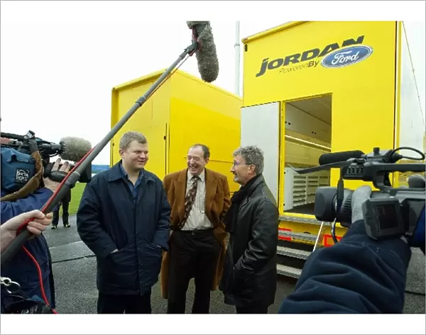 Jordan Ford EJ13 Shakedown: Eddie Jordan, right, is interviewed for television at the shakedown of the new Jordan EJ13