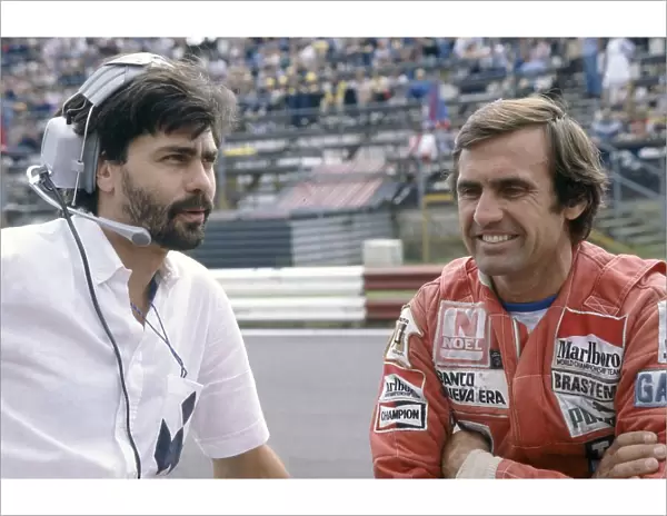 1980 Austrian Grand Prix. Osterreichring, Austria. 15-17 August 1980. Gordon Murray (Brabham designer) with Carlos Reutemann (Williams FW07B-Ford Cosworth). Portrait. World Copyright: LAT Photographic Ref: 35mm transparency 80AUT11