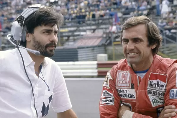 1980 Austrian Grand Prix. Osterreichring, Austria. 15-17 August 1980. Gordon Murray (Brabham designer) with Carlos Reutemann (Williams FW07B-Ford Cosworth). Portrait. World Copyright: LAT Photographic Ref: 35mm transparency 80AUT11