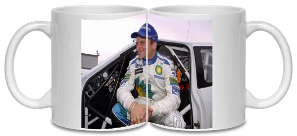 World Rally Championship: Leg 1 rally leader Francois Duval sits in the doorway of his Ford Focus WRC